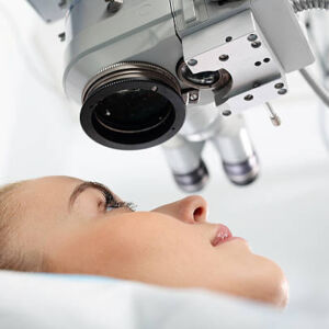 Eye doctor during the treatment of vision refractive surgery