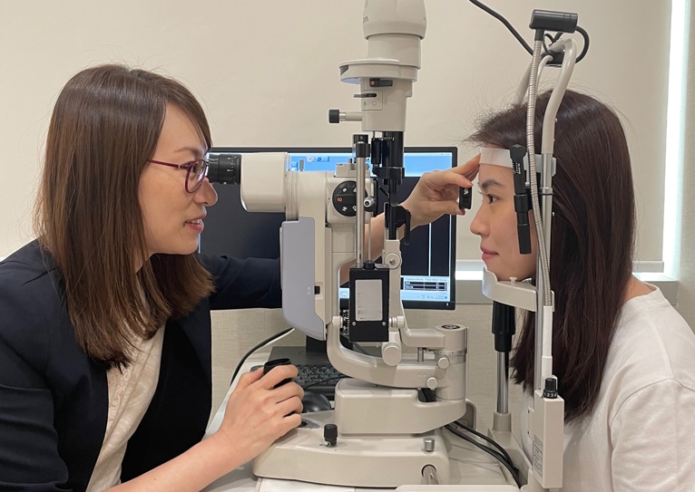 dr-eugnie-consultation-2 Regular eye examinations for early detection and eye care - Eye Max Centre